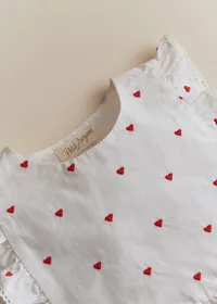 Bavoir Leia - Motif blanc / Broderies Rouges — view 2