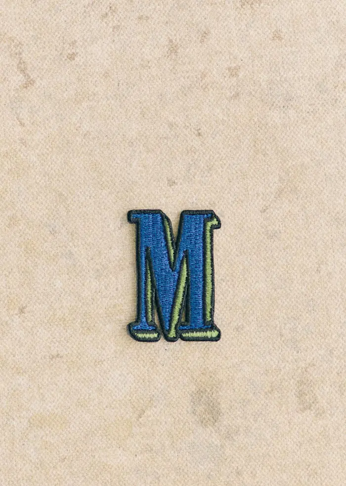 Ecusson vert / bleu - Lettre M - Bleu